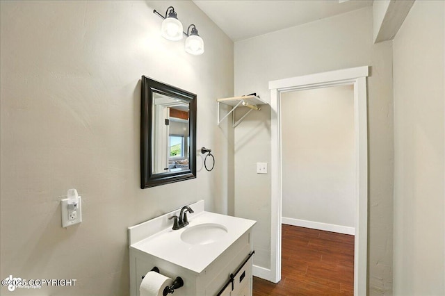 10380 Honey Bear Ln, Anchorage, AK 99516 - bathroom featuring vanity and wood finished floors