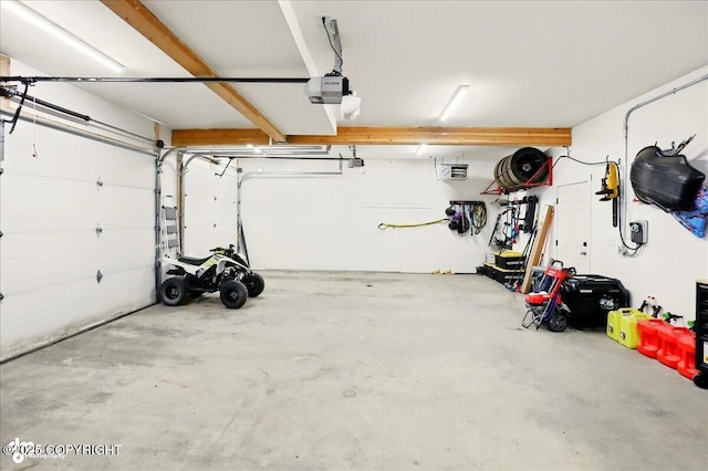 10380 Honey Bear Ln, Anchorage, AK 99516 - garage featuring a garage door opener