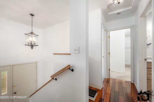 1160 E Susitna Dr, Wasilla, AK 99654 - corridor featuring wood-type flooring and a chandelier