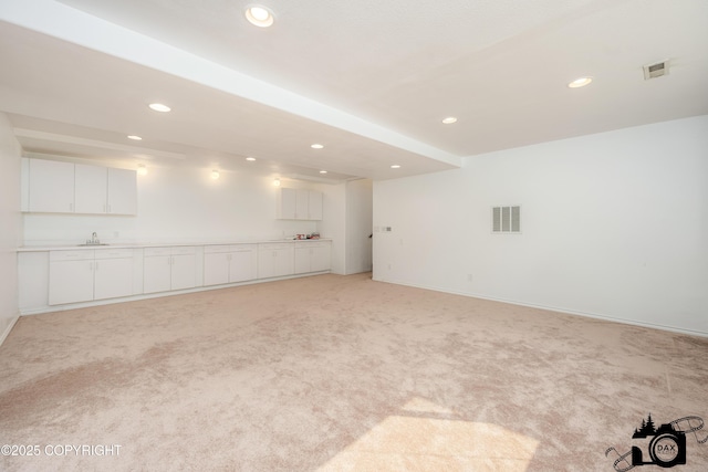 1160 E Susitna Dr, Wasilla, AK 99654 - unfurnished room with light carpet and recessed lighting