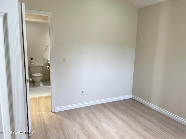 4310 Ambler Cir, Anchorage, AK 99504 - unfurnished bedroom with light wood-type flooring and ensuite bath