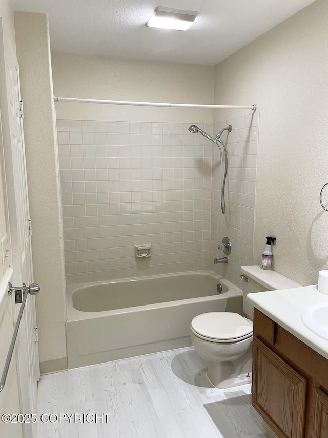 4310 Ambler Cir, Anchorage, AK 99504 - bathroom featuring vanity, bathing tub / shower combination, and wood finished floors