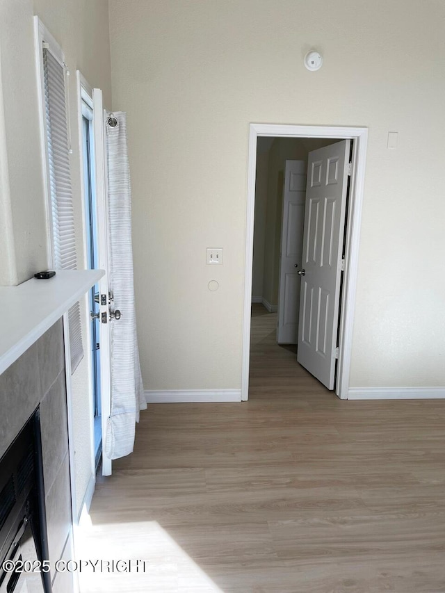 4310 Ambler Cir, Anchorage, AK 99504 - hallway featuring light wood finished floors and baseboards