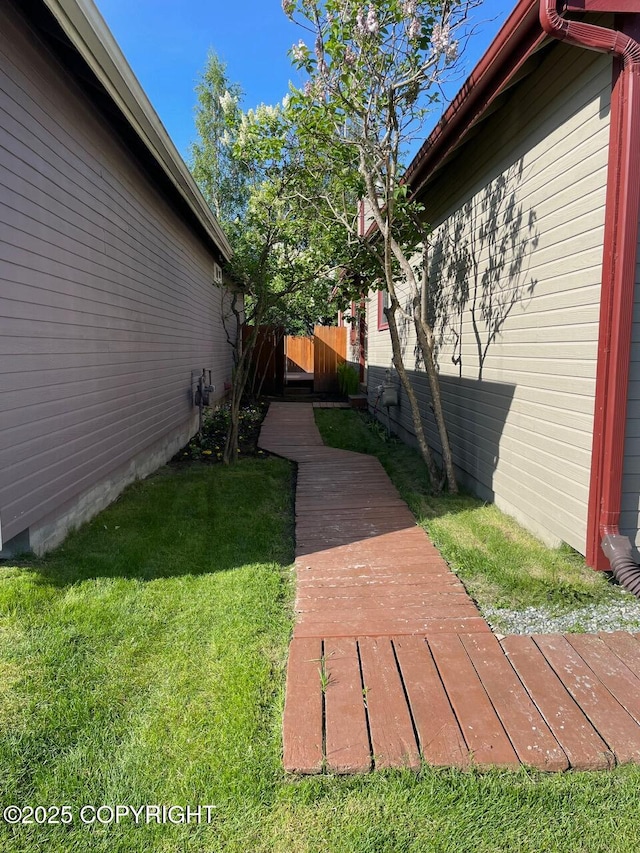 4310 Ambler Cir, Anchorage, AK 99504 - view of yard with a deck
