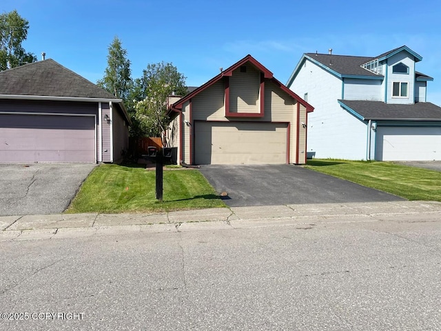 4310 Ambler Cir, Anchorage, AK 99504 - traditional-style home featuring a front yard, a garage, and driveway