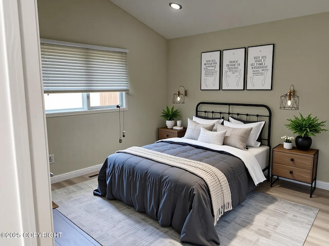 4310 Ambler Cir, Anchorage, AK 99504 - bedroom featuring light wood finished floors, lofted ceiling, and recessed lighting