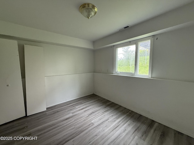 1140 Lalande Pl, Anchorage, AK 99504 - spare room featuring wood finished floors