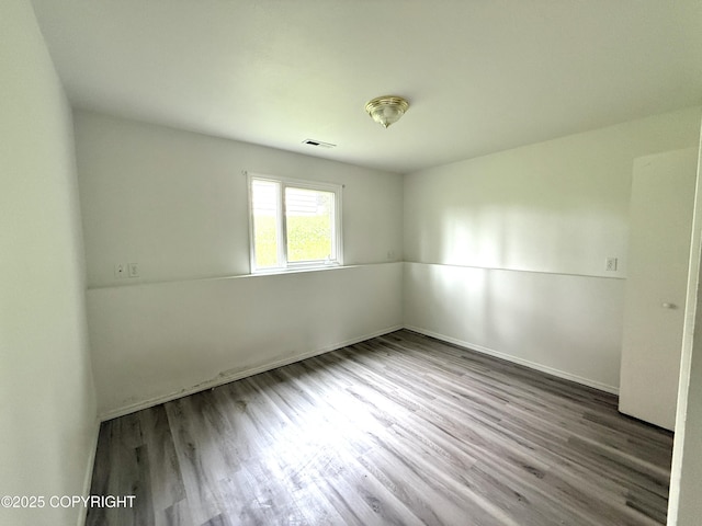 1140 Lalande Pl, Anchorage, AK 99504 - unfurnished room featuring wood finished floors