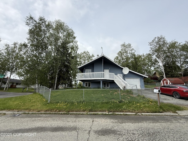 1140 Lalande Pl, Anchorage, AK 99504 - view of front of home featuring a fenced front yard and an attached garage