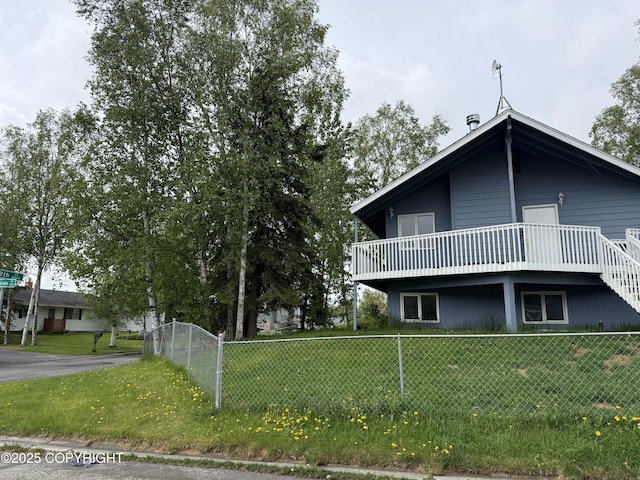 1140 Lalande Pl, Anchorage, AK 99504 - view of side of property with a deck