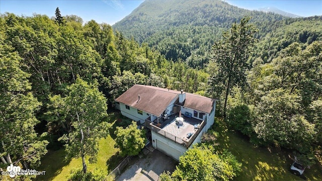 19360 Chugach Park Dr, Chugiak, AK 99567 - view from above of property featuring a heavily wooded area and a mountain backdrop