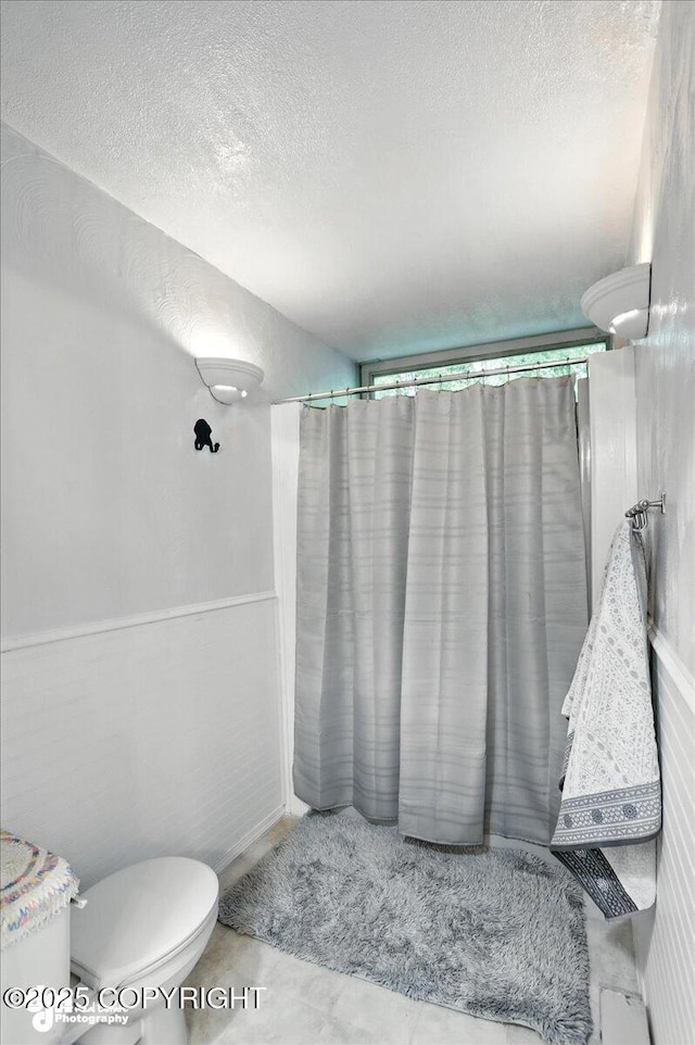 19360 Chugach Park Dr, Chugiak, AK 99567 - full bathroom with a textured ceiling and a shower with curtain