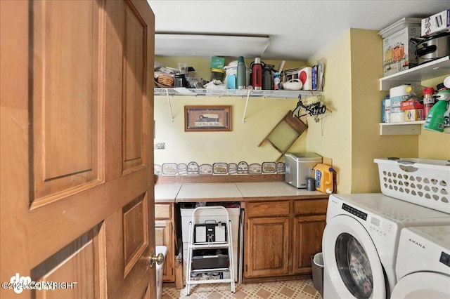 19360 Chugach Park Dr, Chugiak, AK 99567 - laundry area with washer and clothes dryer and cabinet space