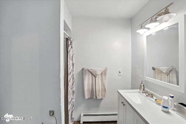 19360 Chugach Park Dr, Chugiak, AK 99567 - bathroom featuring a baseboard radiator and vanity
