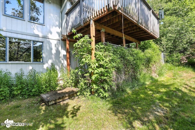 19360 Chugach Park Dr, Chugiak, AK 99567 - view of home's exterior with a wooden deck and a lawn
