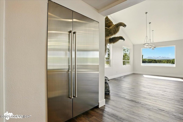 5100 W Lakeside Dr, Wasilla, AK 99654 - kitchen featuring high end refrigerator, dark wood-style floors, and vaulted ceiling