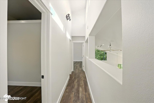 5100 W Lakeside Dr, Wasilla, AK 99654 - hall featuring wood finished floors and baseboards