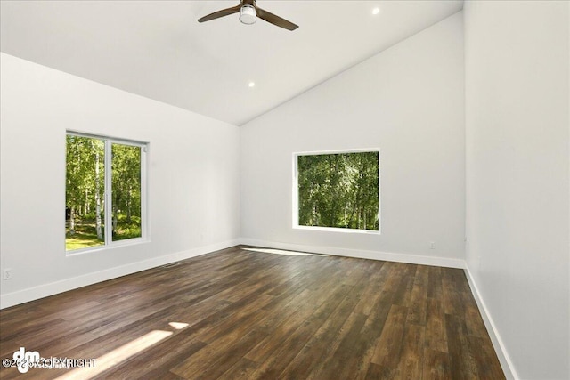 5100 W Lakeside Dr, Wasilla, AK 99654 - spare room with ceiling fan, dark wood-type flooring, high vaulted ceiling, and recessed lighting