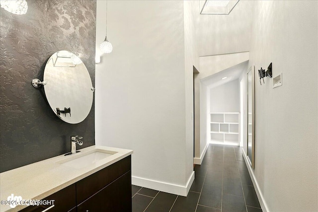 5100 W Lakeside Dr, Wasilla, AK 99654 - bathroom with vanity and tile patterned flooring