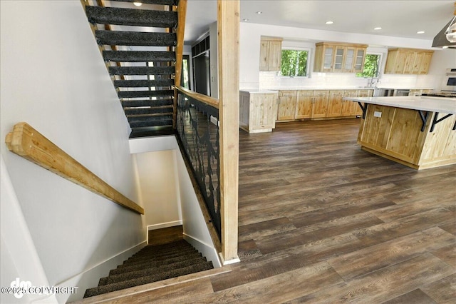 5100 W Lakeside Dr, Wasilla, AK 99654 - kitchen with light brown cabinetry, light countertops, dark wood-style flooring, tasteful backsplash, and recessed lighting