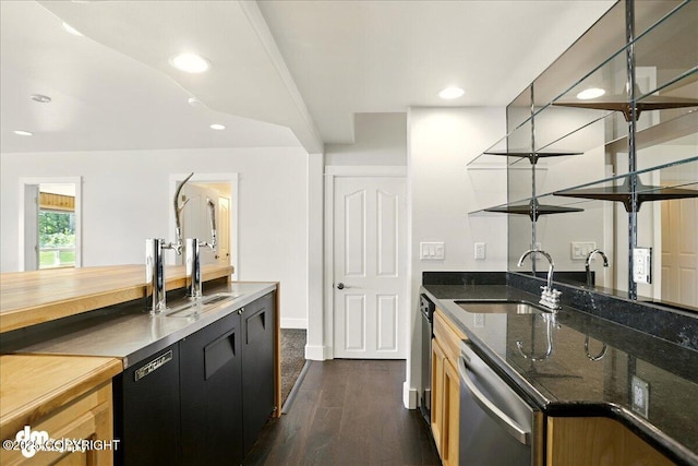 5100 W Lakeside Dr, Wasilla, AK 99654 - kitchen with dishwasher, dark wood-style flooring, recessed lighting, dark stone countertops, and open shelves