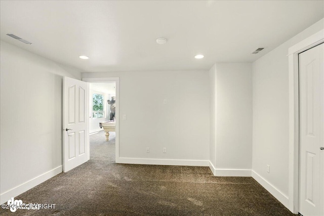 5100 W Lakeside Dr, Wasilla, AK 99654 - unfurnished room featuring dark carpet and recessed lighting