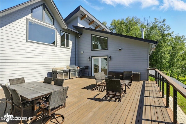 5100 W Lakeside Dr, Wasilla, AK 99654 - deck with outdoor dining area and grilling area