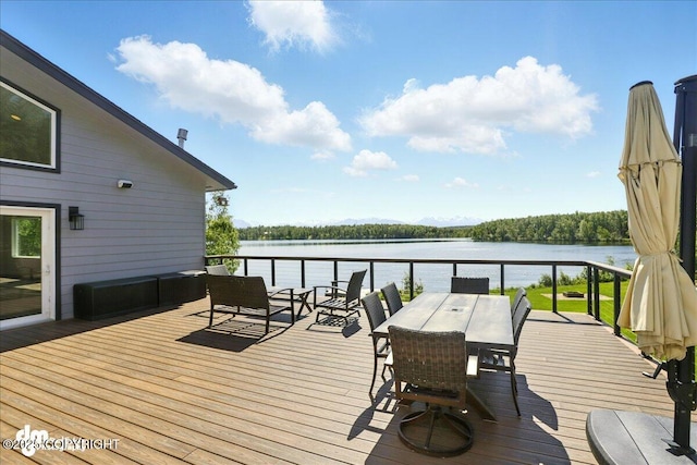 5100 W Lakeside Dr, Wasilla, AK 99654 - wooden terrace featuring a water view and outdoor dining area