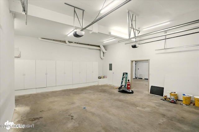 5100 W Lakeside Dr, Wasilla, AK 99654 - garage with electric panel and a garage door opener