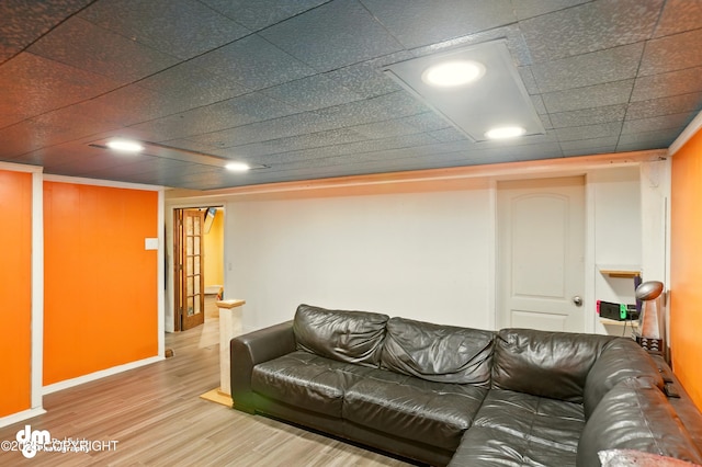 3401 Lois Dr, Anchorage, AK 99517 - living room featuring wood finished floors and baseboards