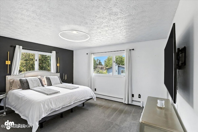 13481 Baywind Dr, Anchorage, AK 99516 - bedroom featuring a baseboard heating unit, carpet, and a textured ceiling