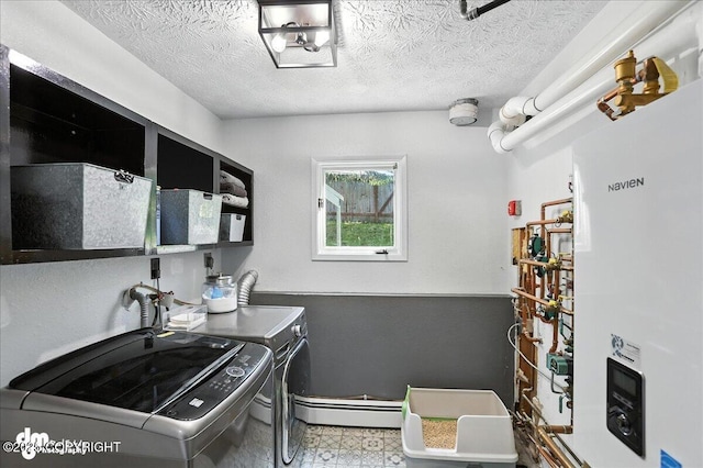 13481 Baywind Dr, Anchorage, AK 99516 - laundry area with washing machine and dryer, a baseboard radiator, a textured ceiling, tile patterned floors, and tankless water heater