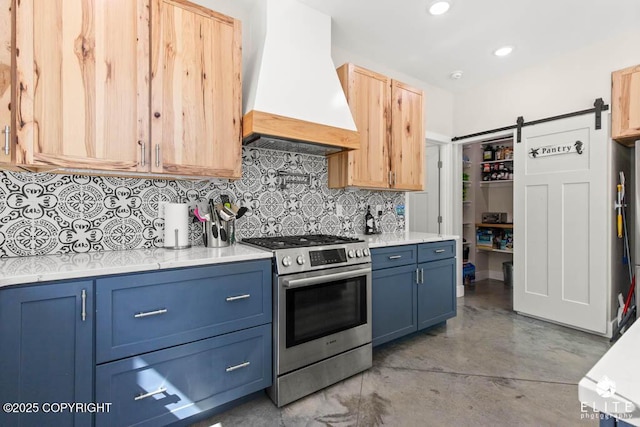 4722 S Gon Fishin Dr, Wasilla, AK 99623 - kitchen with custom exhaust hood, electric range, blue cabinets, decorative backsplash, and finished concrete flooring