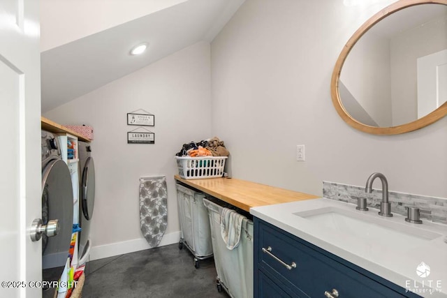 4722 S Gon Fishin Dr, Wasilla, AK 99623 - washroom featuring washing machine and dryer and recessed lighting