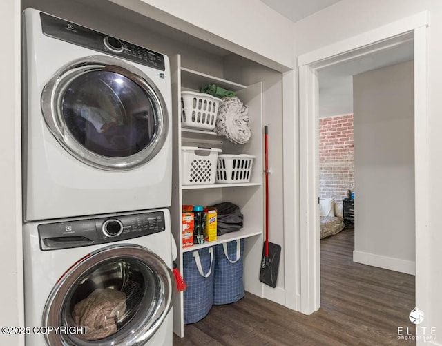 4722 S Gon Fishin Dr, Wasilla, AK 99623 - laundry room with stacked washer and clothes dryer and wood finished floors