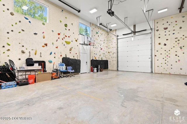 4722 S Gon Fishin Dr, Wasilla, AK 99623 - garage featuring a garage door opener