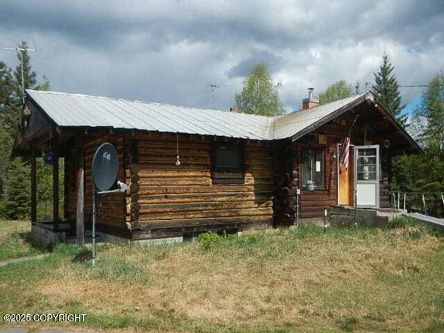 2030 Haydon Ct, Fairbanks, AK 99701 - log home featuring log exterior and a metal roof