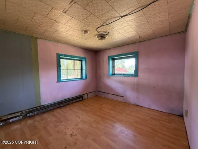 2030 Haydon Ct, Fairbanks, AK 99701 - unfurnished room with wood finished floors