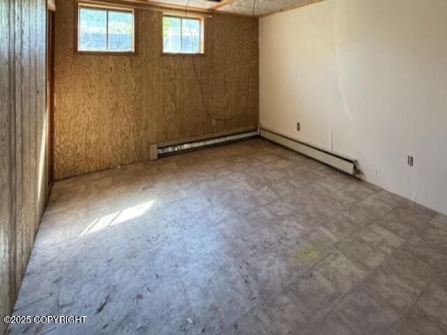 2030 Haydon Ct, Fairbanks, AK 99701 - basement featuring baseboard heating and a baseboard heating unit