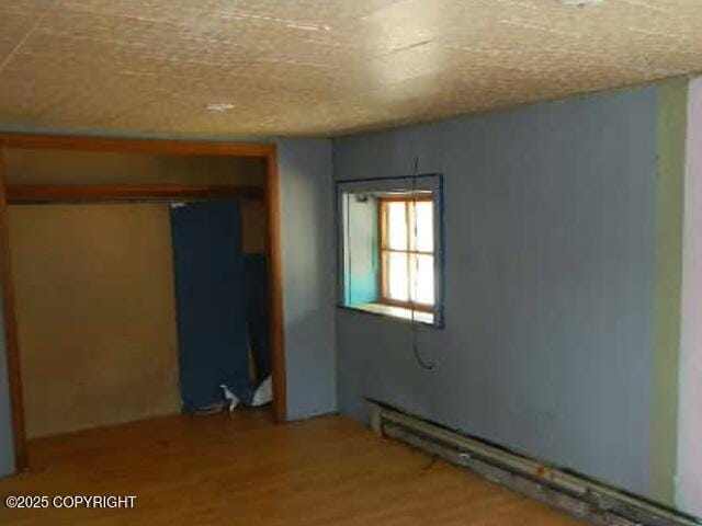 2030 Haydon Ct, Fairbanks, AK 99701 - unfurnished bedroom featuring light wood finished floors and a closet