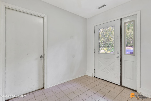 3150 E Escondido Ave, Wasilla, AK 99654 - foyer entrance featuring light tile patterned floors and baseboards
