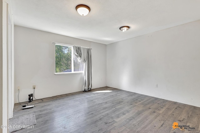 3150 E Escondido Ave, Wasilla, AK 99654 - spare room with wood finished floors