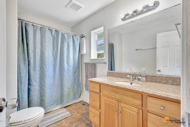 3150 E Escondido Ave, Wasilla, AK 99654 - bathroom featuring vanity, tile patterned flooring, and shower / bath combo with shower curtain
