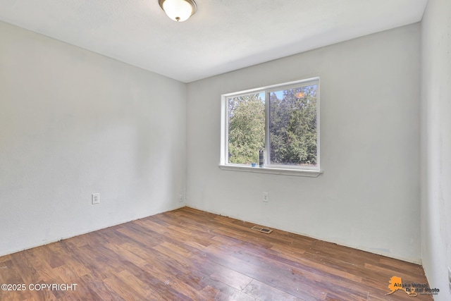 3150 E Escondido Ave, Wasilla, AK 99654 - empty room with wood finished floors