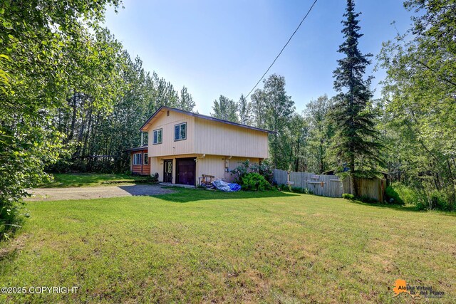 3150 E Escondido Ave, Wasilla, AK 99654 - view of property exterior with driveway and a garage