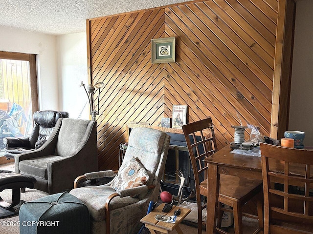 4376 Dartmouth Dr # 9, Fairbanks, AK 99709 - living room featuring wooden walls and a textured ceiling