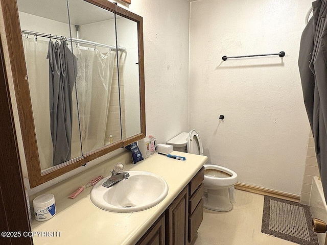 4376 Dartmouth Dr # 9, Fairbanks, AK 99709 - bathroom featuring vanity, curtained shower, and a textured wall