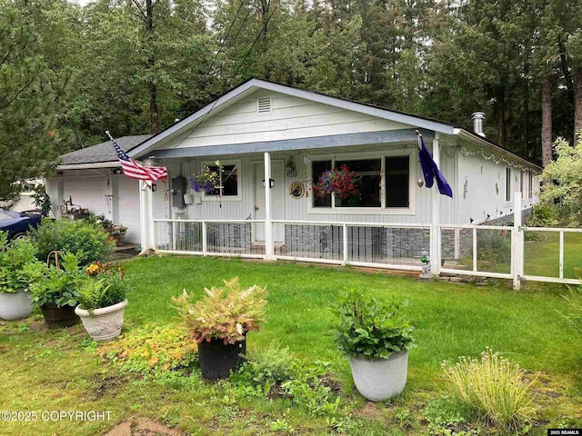 4128 Taku Blvd, Juneau, AK 99801 - view of front of home with a porch and an attached garage