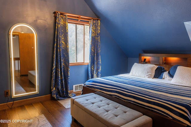 413 N Higgins Ct, Ketchikan, AK 99901 - bedroom with lofted ceiling and wood finished floors