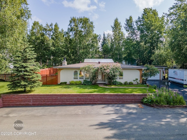 14121 Sunview Dr, Anchorage, AK 99515 - view of front facade featuring stucco siding and a chimney